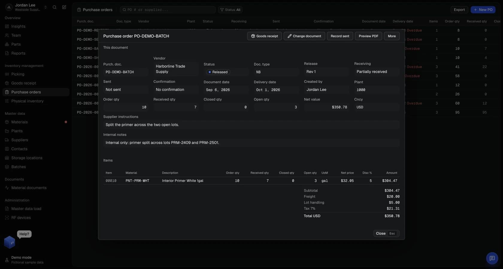 A purchase order open in VectisERP with ordered and received quantities and a partially received status